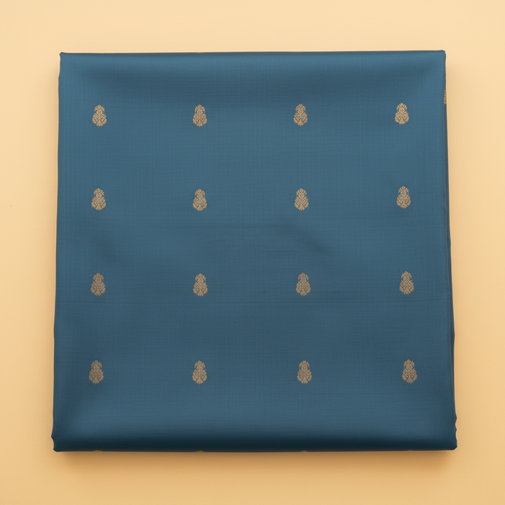 Blue pure silk saree body with gold zari motifs close-up