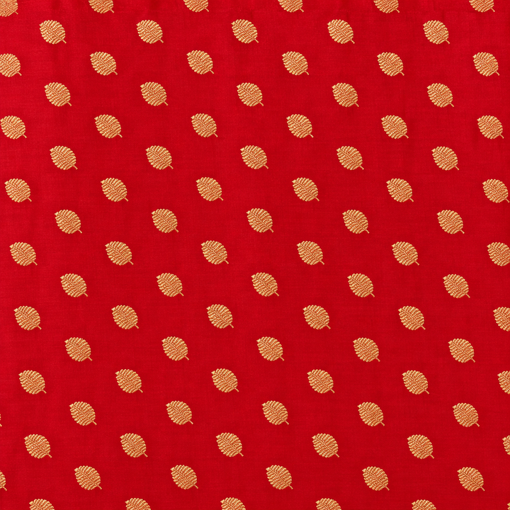 Close-up of the red Banarasi body with gold zari leaf bootas