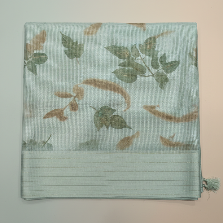 Close-up of the pastel blue Kota cotton saree leafy weave