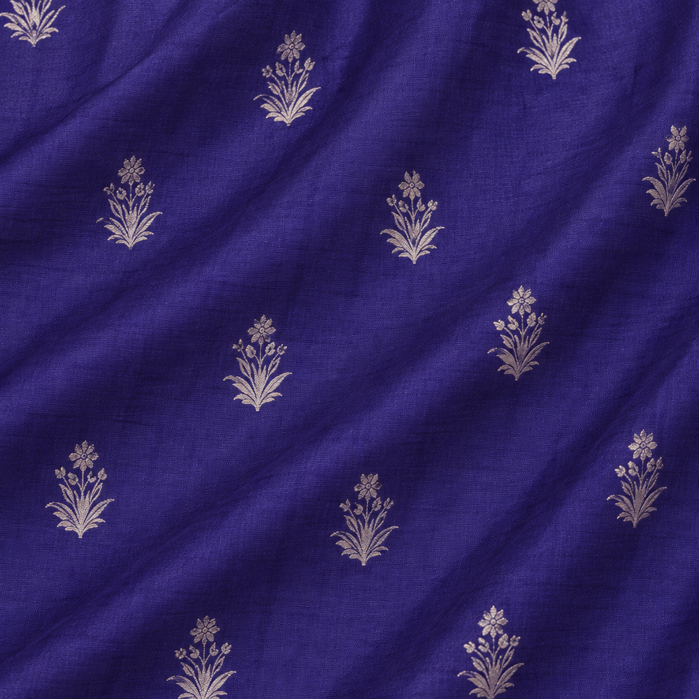 Close-up of the navy blue pure Tussar silk saree body with silver zari floral motifs