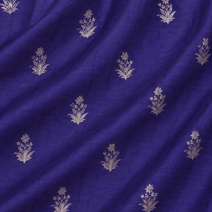 Close-up of the navy blue pure Tussar silk saree body with silver zari floral motifs