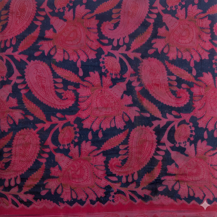 Close-up of pink paisley and floral motifs on navy cotton dance saree
