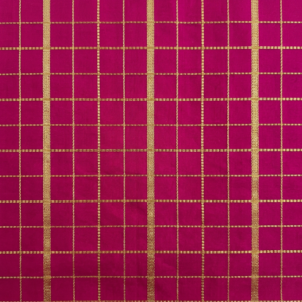 Close-up of the magenta pink saree section with gold zari checked grid pattern