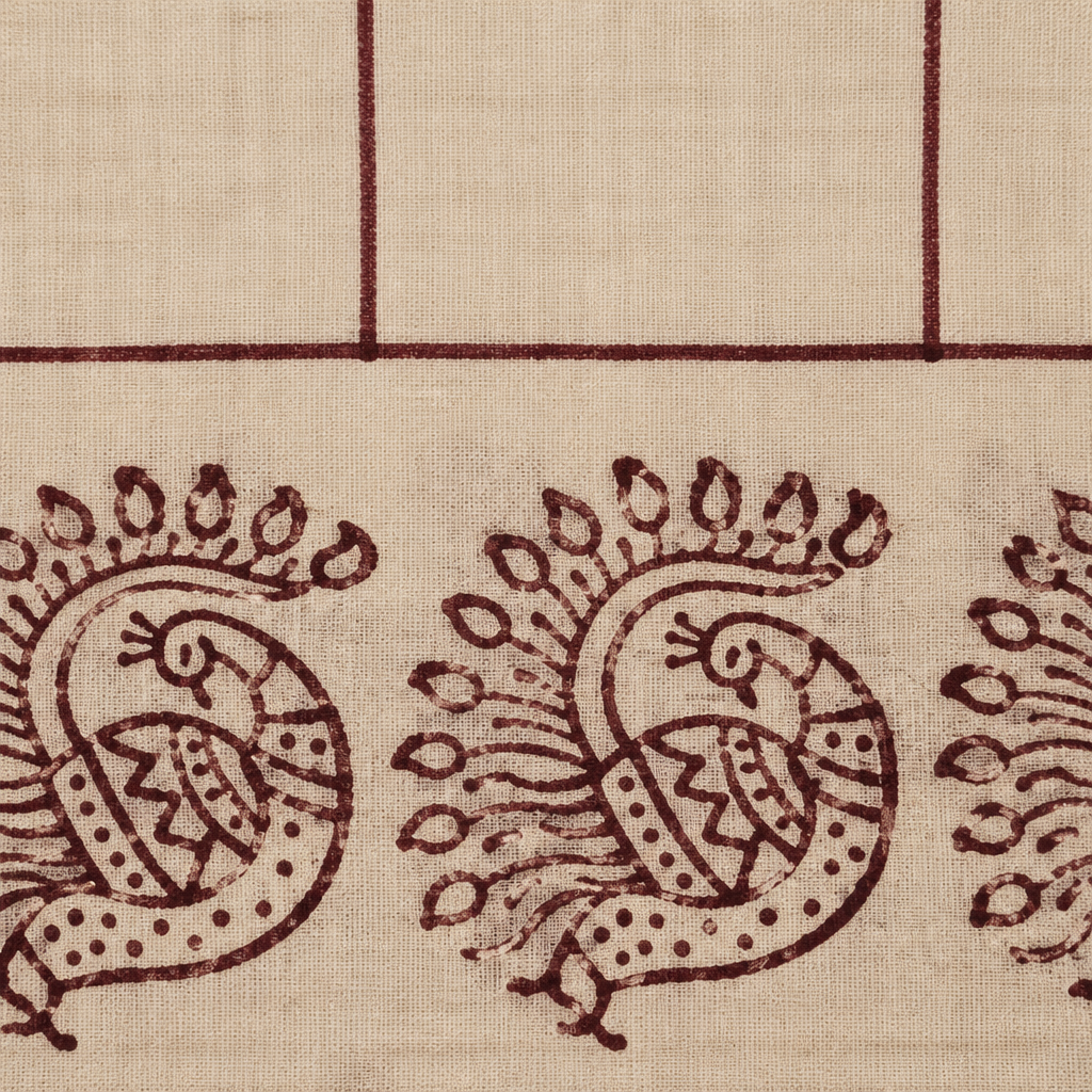 Close-up of peacock print border on cream cotton dance saree