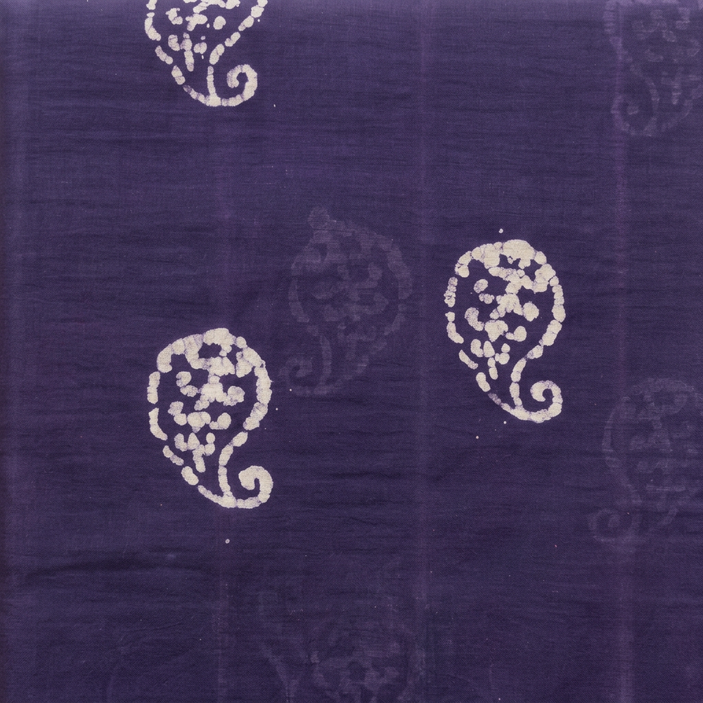 Cream paisley and tonal motifs on purple cotton dance saree, body close-up