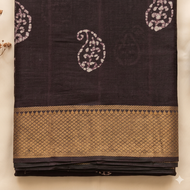 Gold-toned diamond-lattice border on dark purple cotton dance saree, close-up