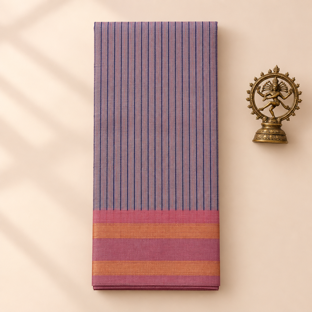 Lilac striped cotton dance saree with pink border, folded flat lay with Nataraja prop