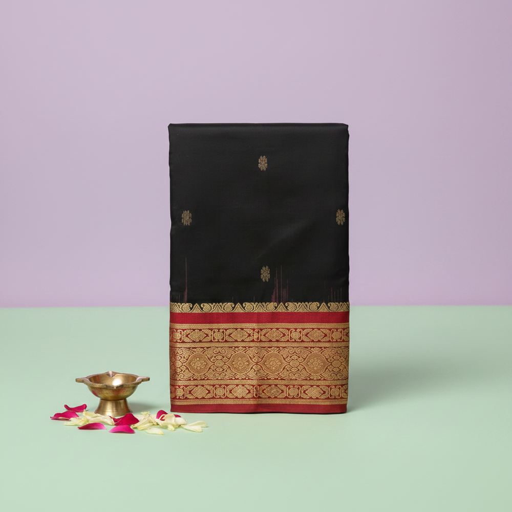Black Kanchipuram silk dance saree – upright front view, pastel lavender background, dance theme