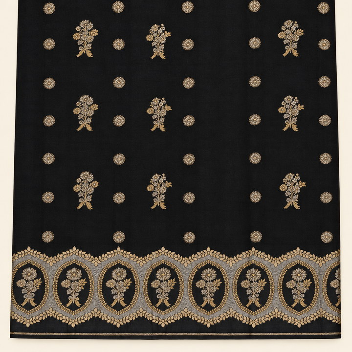Black saree floral butta body and ornate gold-toned medallion border close-up