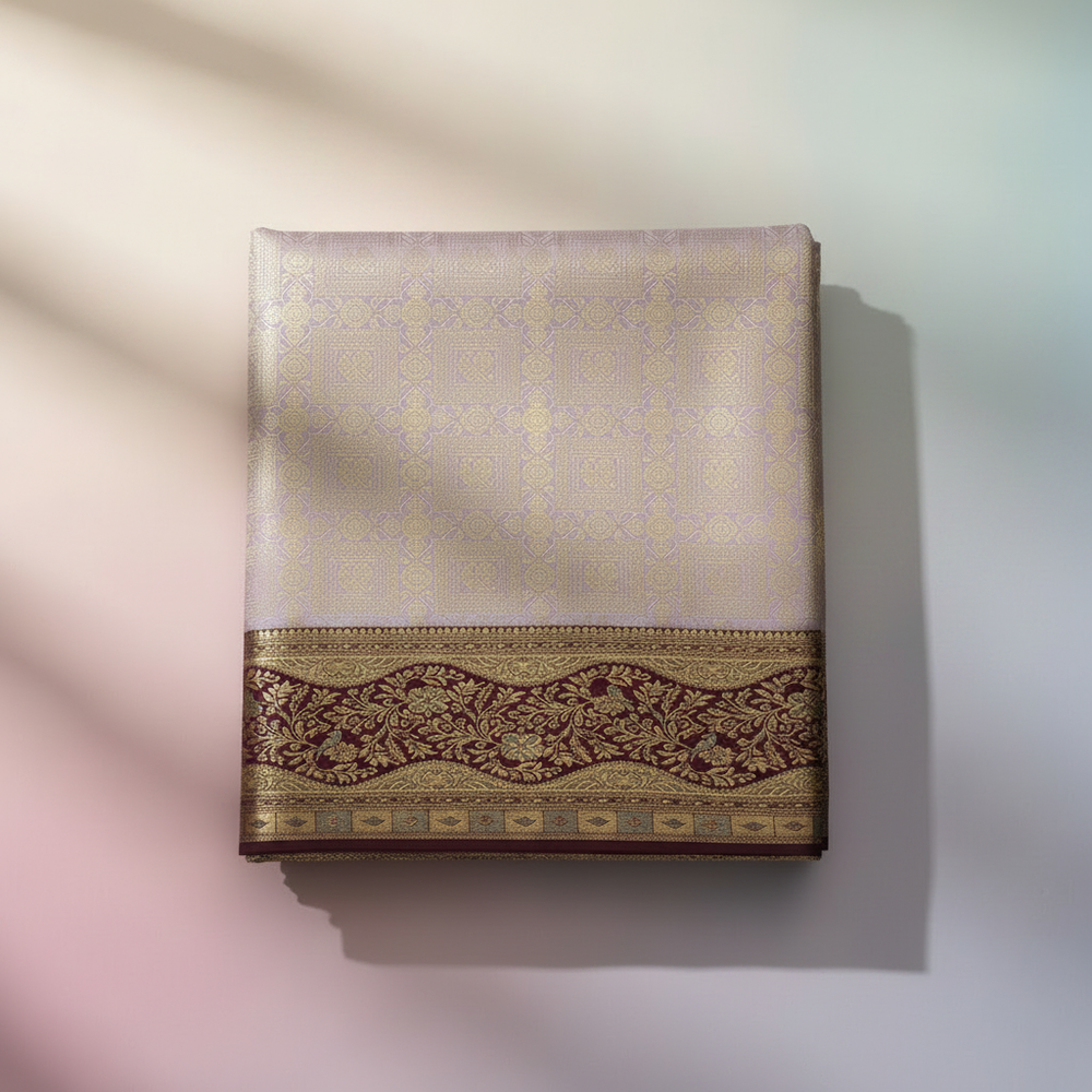 Close-up of lavender semi-silk saree with subtle woven zari motifs