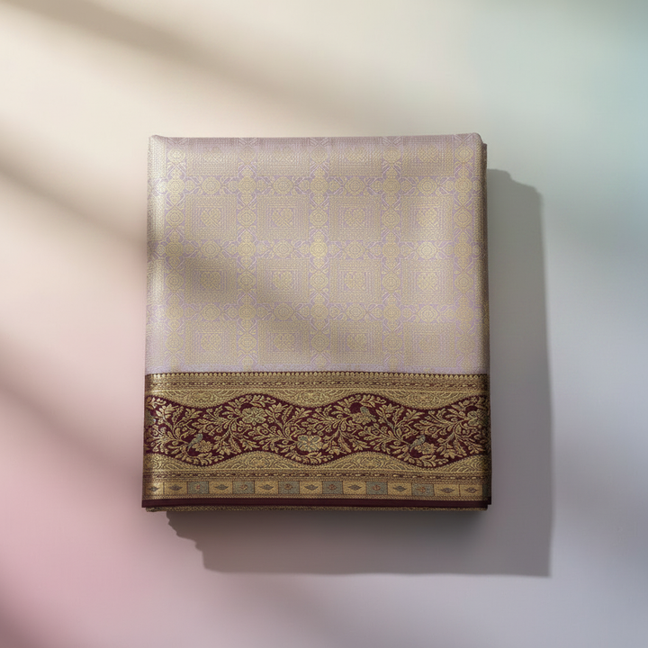 Close-up of lavender semi-silk saree with subtle woven zari motifs