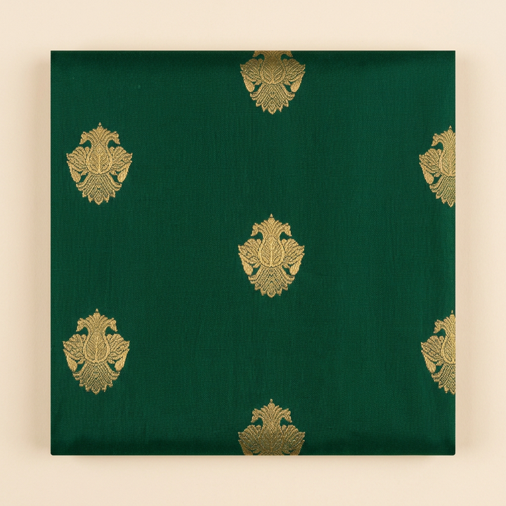 Close-up of the dark green saree body with scattered gold butta motifs