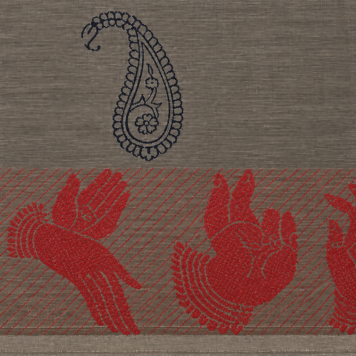 Close-up of red woven bird motifs on grey saree pallu