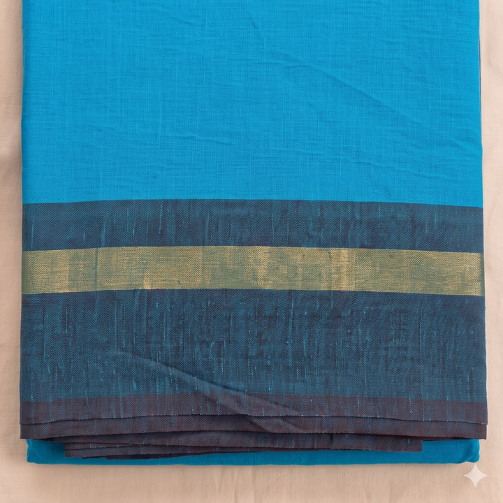 Dark blue border with gold-toned stripe on turquoise cotton dance saree, close-up