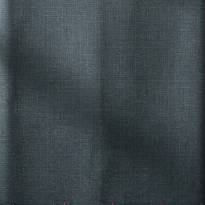 Close-up of the charcoal-grey and near-black cotton saree body showing its soft subtle tonal weave