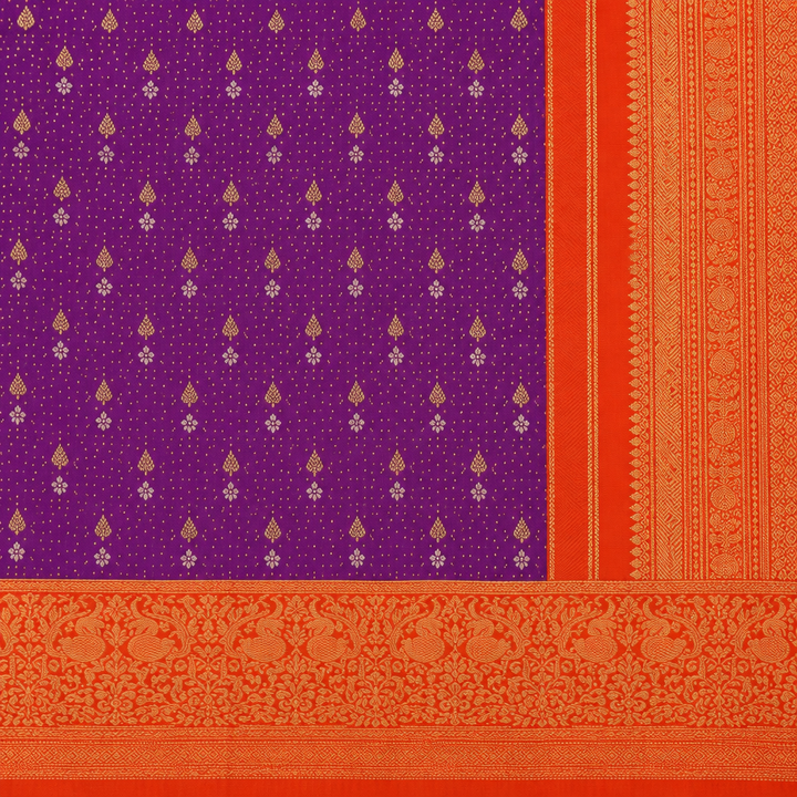 Close-up of purple saree body motifs and orange-gold ornate border