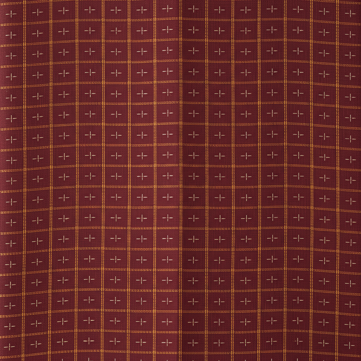 Close-up of the maroon and burgundy cotton saree with a fine mustard-gold and orange checked weave and small light woven cross motifs