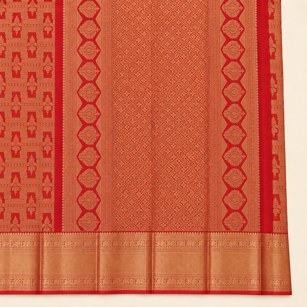 Copper-gold-toned pallu with red outlined medallion bands close-up