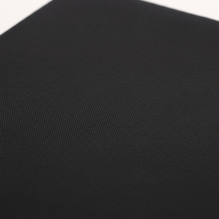 Close-up detail of black fabric texture