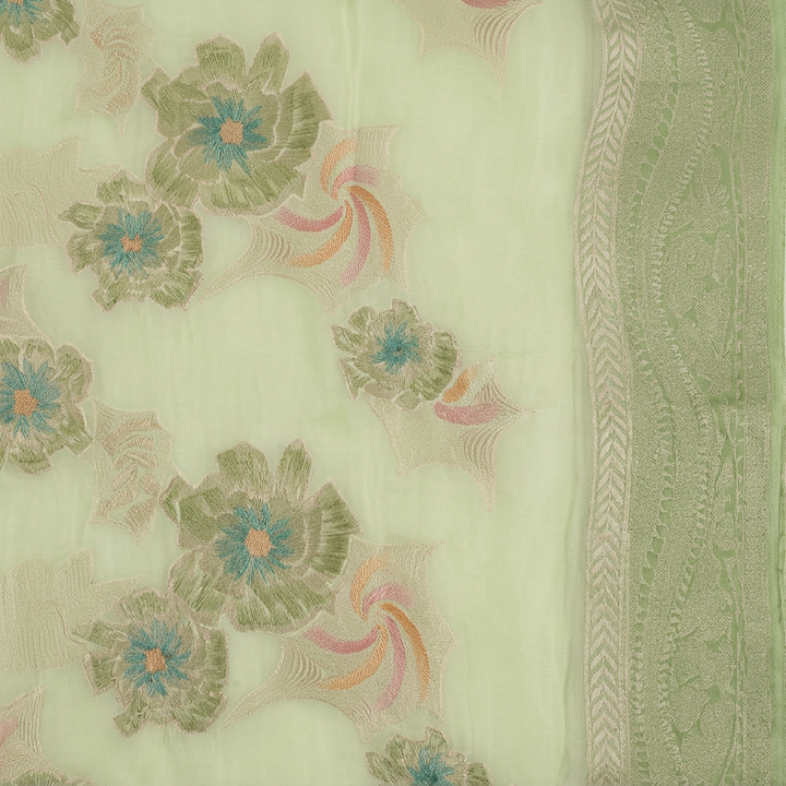 Close-up of coordinated green decorative border and floral chiffon body