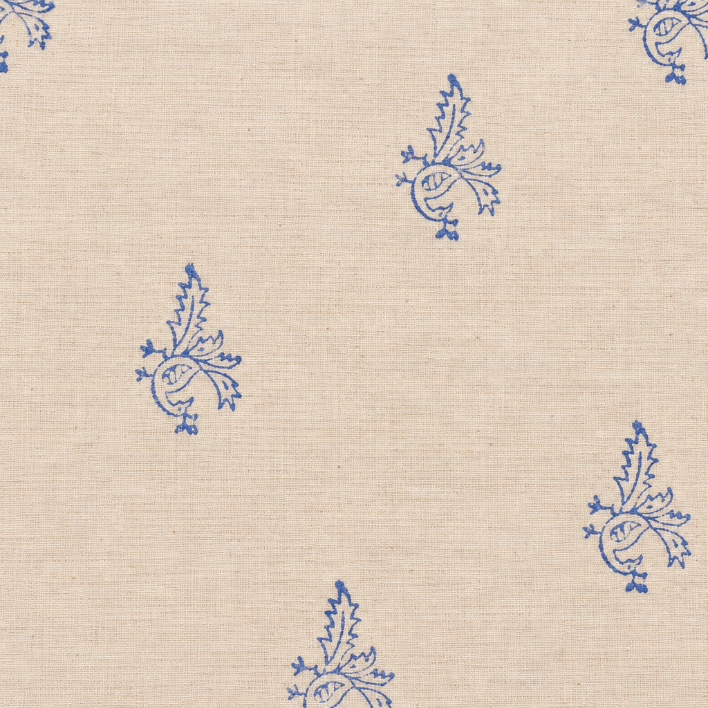 Close-up of blue bird buta on cream cotton saree body
