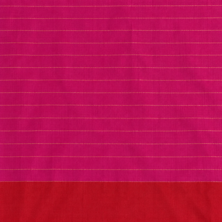 Close-up of pink saree body with fine horizontal lines and red transition