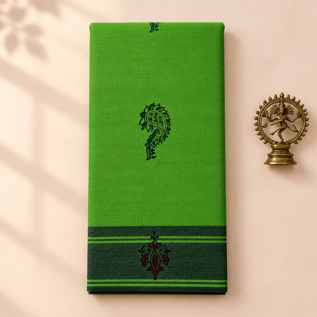 Parrot green cotton dance saree with bottle green border, folded flat lay with Nataraja prop