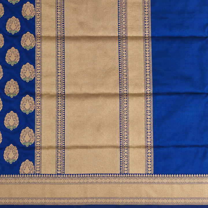 Royal blue saree gold-toned pallu and ornamental vertical border close-up