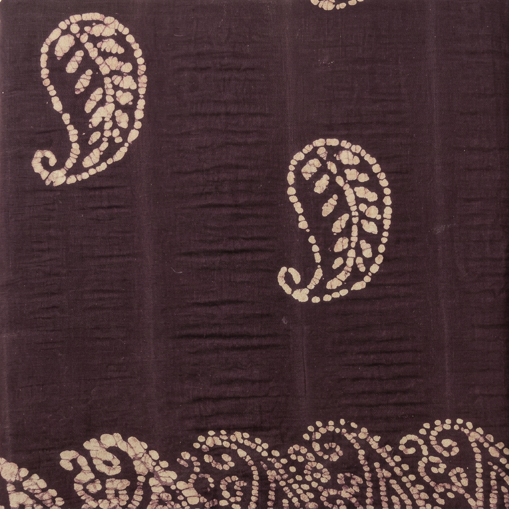Cream paisley motifs on deep purple cotton dance saree, body close-up