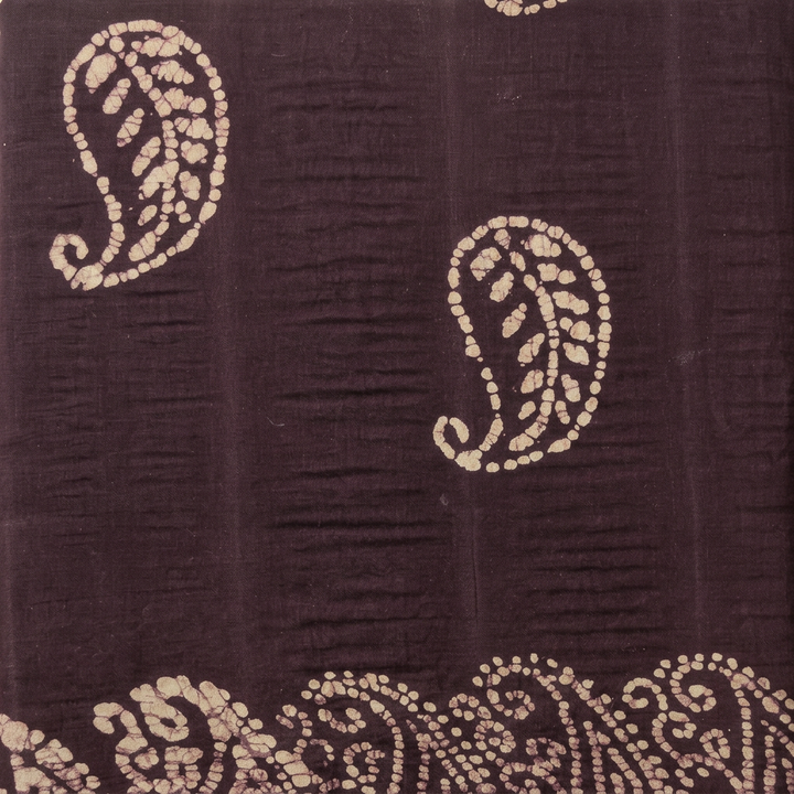 Cream paisley motifs on deep purple cotton dance saree, body close-up