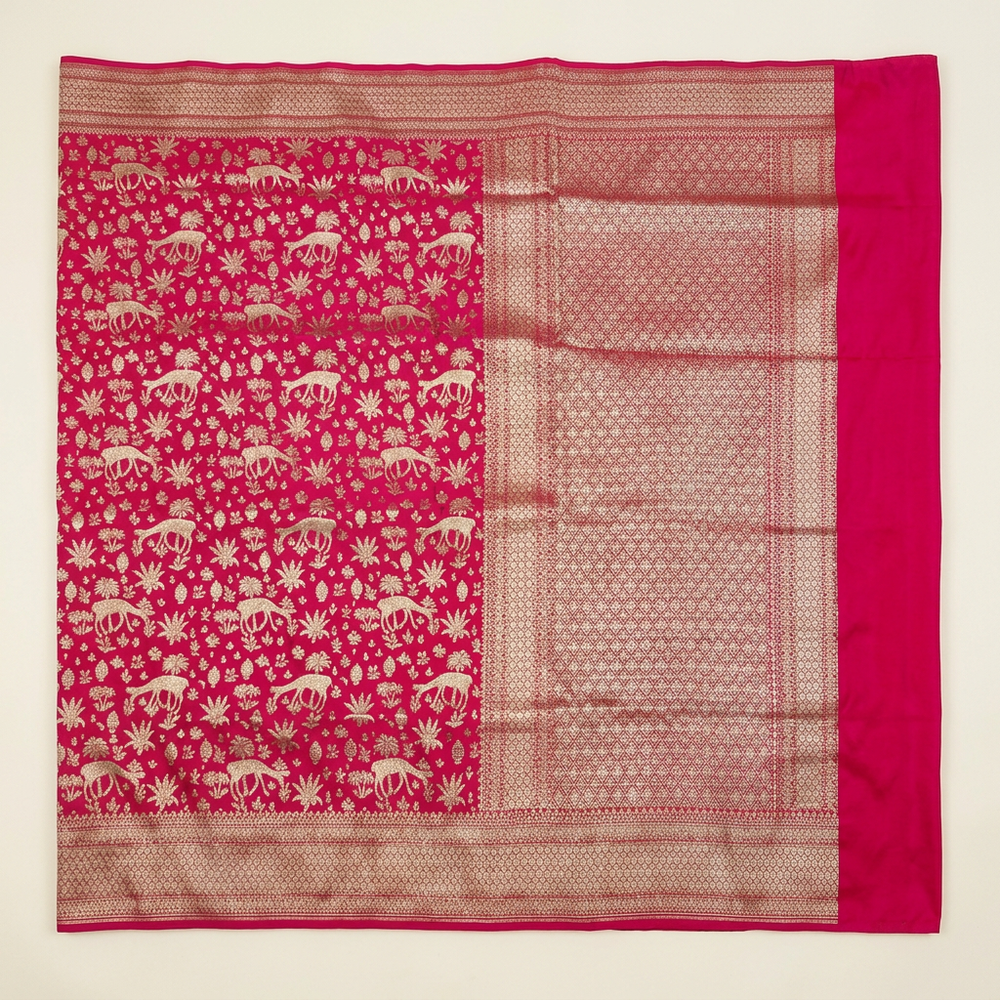 Upright overhead pink semi Banarasi saree with metallic animal-and-foliage motifs and geometric lattice pallu