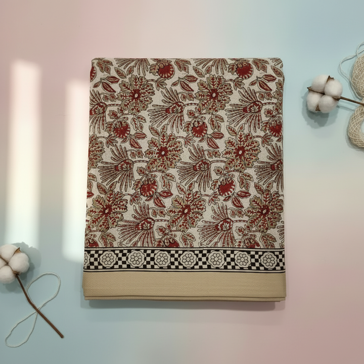 Beige and red Chanderi cotton saree close-up showing woven texture and contrast detailing