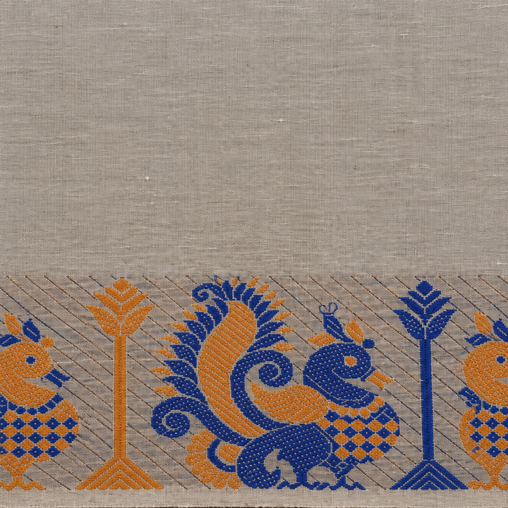 Close-up of light grey cotton saree body and border edge