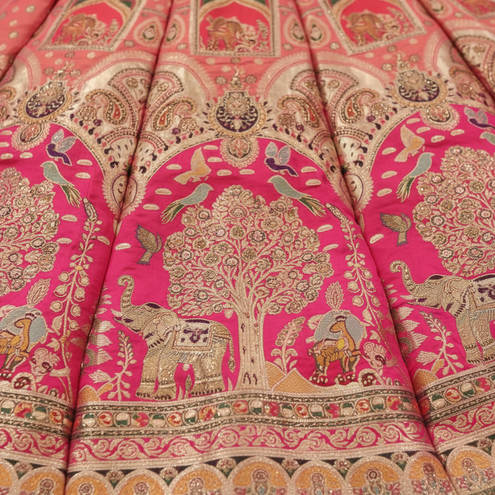 Kuberan Hot Pink Banarasi Silk Lehenga with Gold Zari Elephant Motif semi stitched