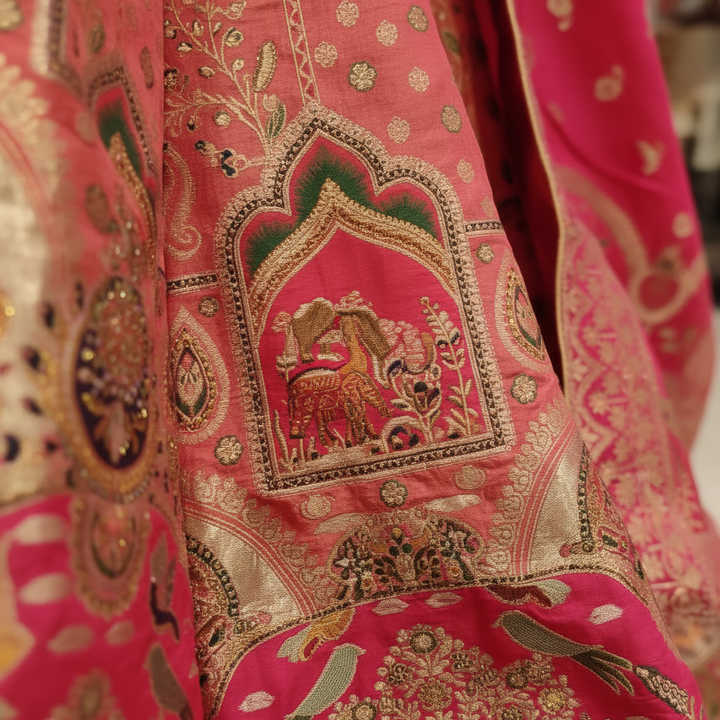Kuberan Hot Pink Banarasi Silk Lehenga with Gold Zari Elephant Motif semi stitched