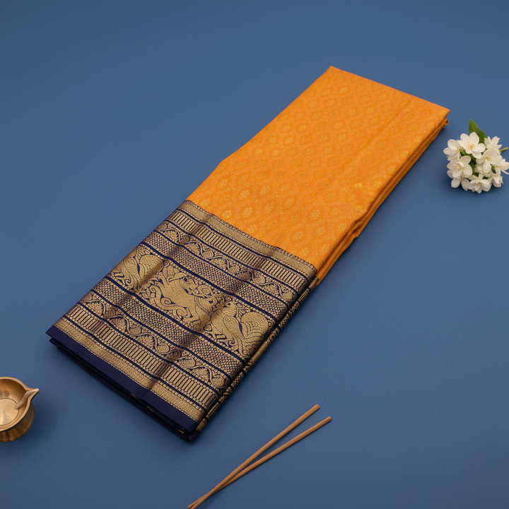 kuberan Marigold Yellow Kanchipuram Silk Saree with Navy Blue Zari Border