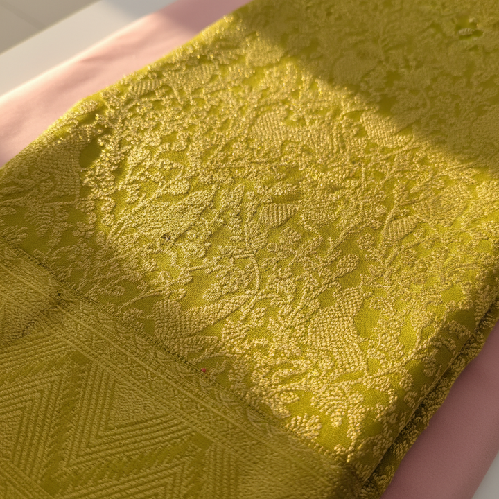 Olive green Kanchipuram silk saree body with tone-on-tone gold zari floral jaal close-up
