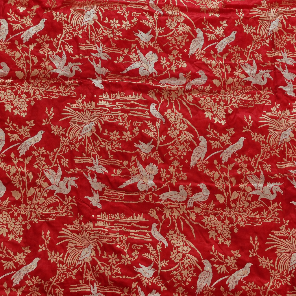 Red saree bird-and-floral close-up preview