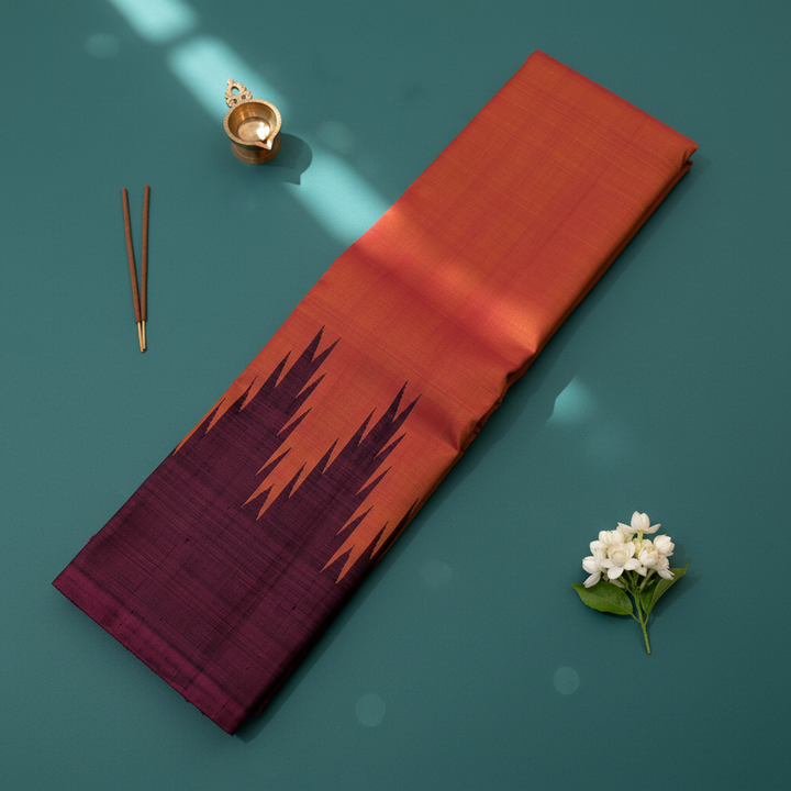 kuberan Rust Orange Kanchipuram Silk Saree with Deep Purple Temple Border