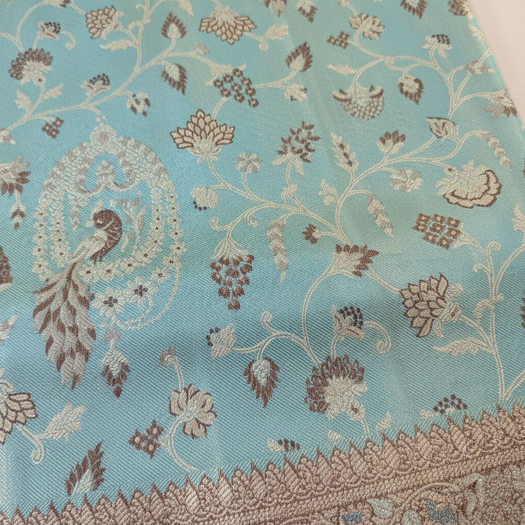 Turquoise Kanchipuram Silk Saree with Silver Peacock Motifs