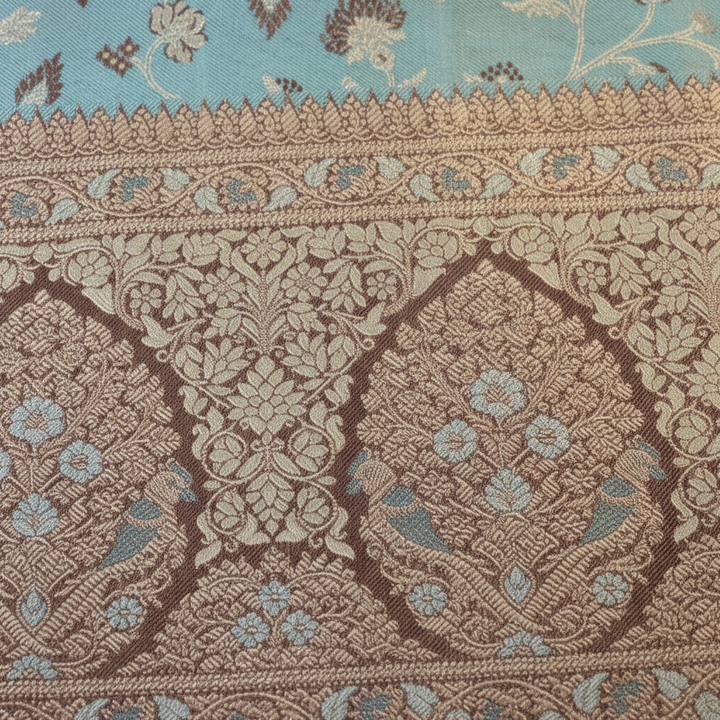 Turquoise Kanchipuram Silk Saree with Silver Peacock Motifs