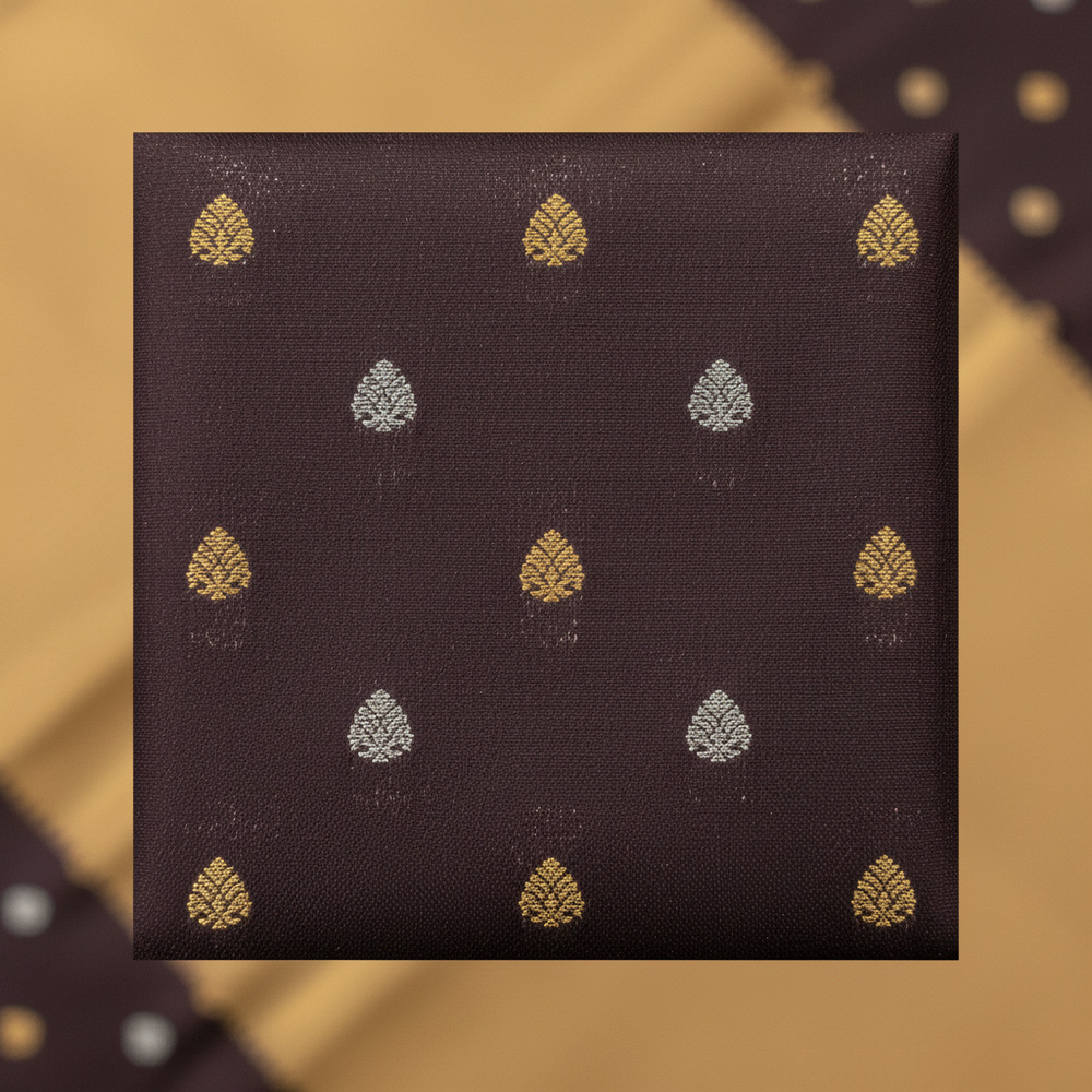 Close-up of gold and silver zari boteh motifs on body